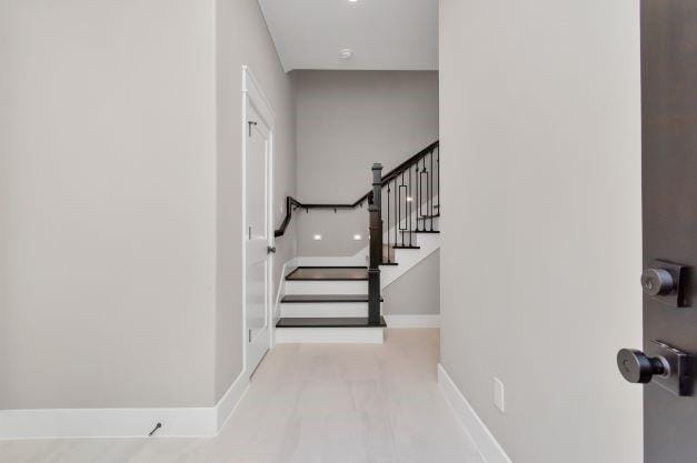 stairway with baseboards