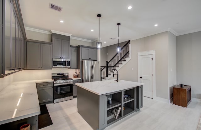 kitchen featuring visible vents, open shelves, appliances with stainless steel finishes, and gray cabinetry