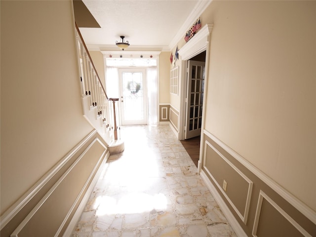 4202 Astwood Ct, Houston, TX 77068 - hall with crown molding, a wainscoted wall, stairway, and a decorative wall