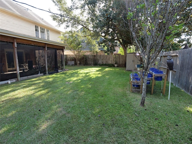 4202 Astwood Ct, Houston, TX 77068 - view of yard with a sunroom, a fenced backyard, a shed, and an outbuilding