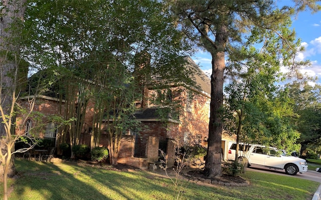 4202 Astwood Ct, Houston, TX 77068 - view of side of home with a yard and brick siding