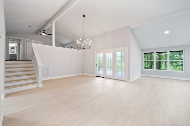 unfurnished living room featuring baseboards, vaulted ceiling with beams, light wood-style flooring, and visible vents