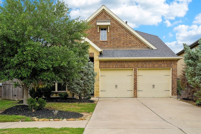29126 Brooks Valley Dr, Fulshear, TX 77441 - craftsman inspired home featuring brick siding, an attached garage, roof with shingles, and driveway