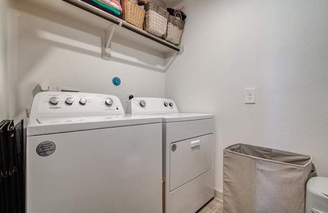 14543 Rain Tree Dr, Baytown, TX 77523 - clothes washing area with laundry area and independent washer and dryer