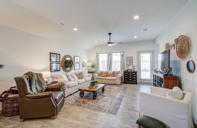 14543 Rain Tree Dr, Baytown, TX 77523 - living area with ceiling fan, visible vents, vaulted ceiling, recessed lighting, and light wood-style flooring
