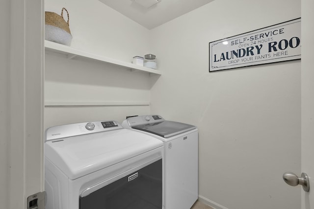 laundry area featuring washer and dryer and laundry area