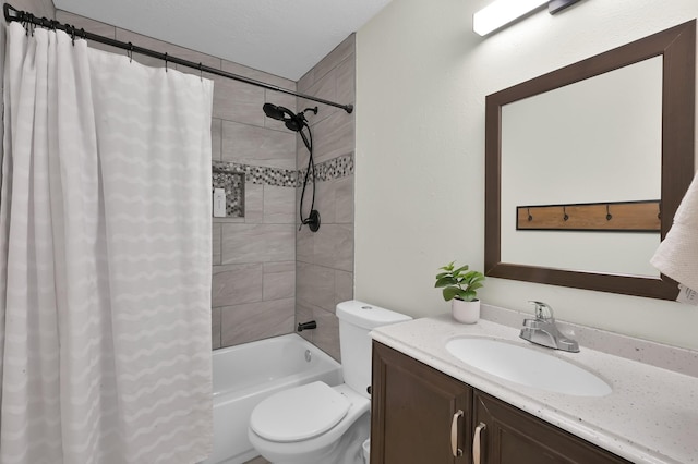 bathroom with vanity, shower / bathtub combination with curtain, and toilet