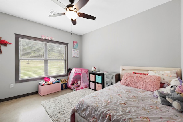 bedroom featuring baseboards, visible vents, and ceiling fan