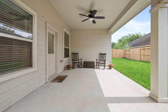 view of patio with ceiling fan and a fenced backyard