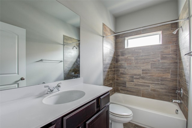 full bathroom featuring vanity, shower / bathing tub combination, and toilet