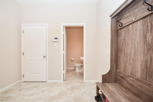mudroom featuring baseboards