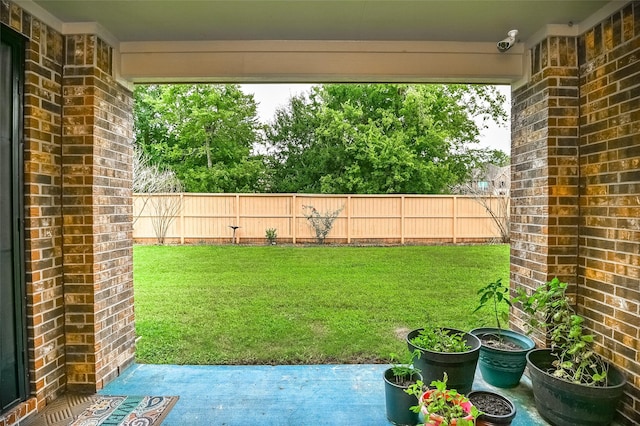 view of yard featuring a fenced backyard and a patio