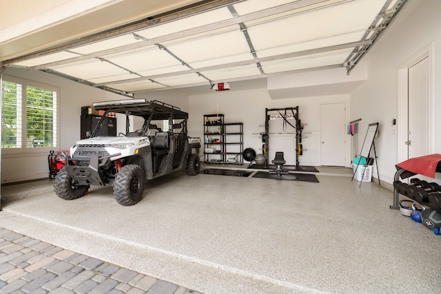 garage featuring a garage door opener