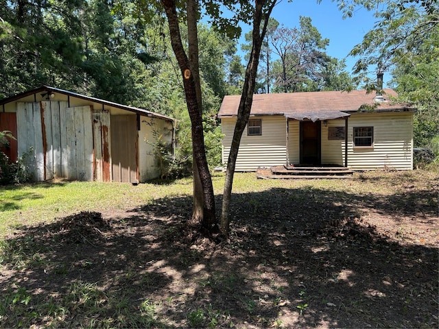 8513 Fountain Dr, Silsbee, TX 77656 - exterior space featuring an outbuilding and a shed