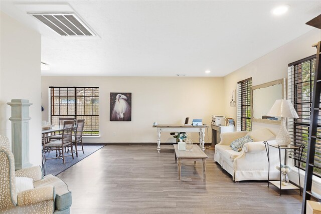 2021 Caravel Dr, League City, TX 77573 - living room with baseboards, recessed lighting, wood finished floors, and visible vents