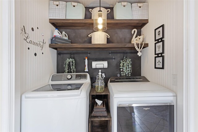 2021 Caravel Dr, League City, TX 77573 - laundry room with wallpapered walls and independent washer and dryer