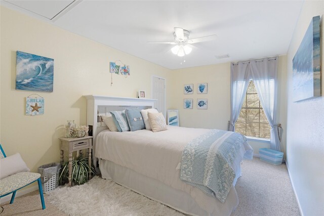 2021 Caravel Dr, League City, TX 77573 - bedroom featuring carpet floors, baseboards, and a ceiling fan