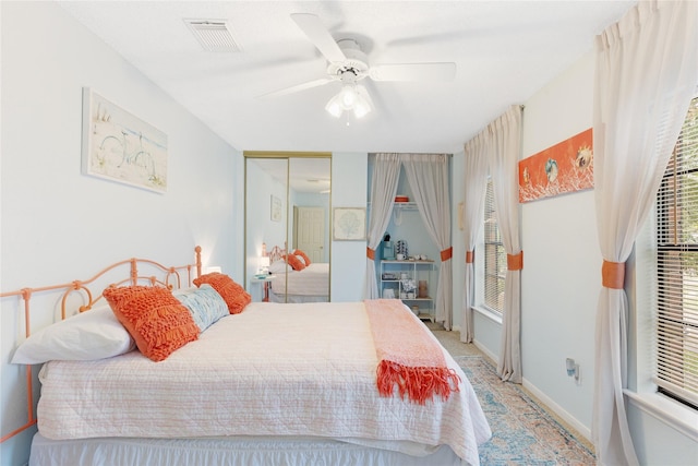 2021 Caravel Dr, League City, TX 77573 - bedroom featuring visible vents, a ceiling fan, baseboards, and a closet