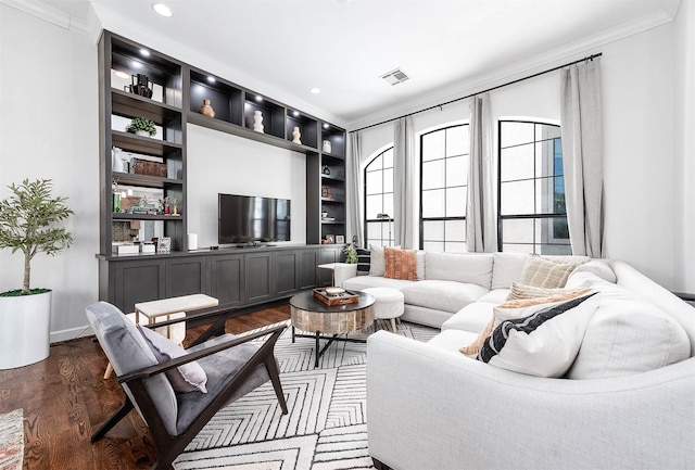 living area with ornamental molding, dark wood-type flooring, recessed lighting, and visible vents