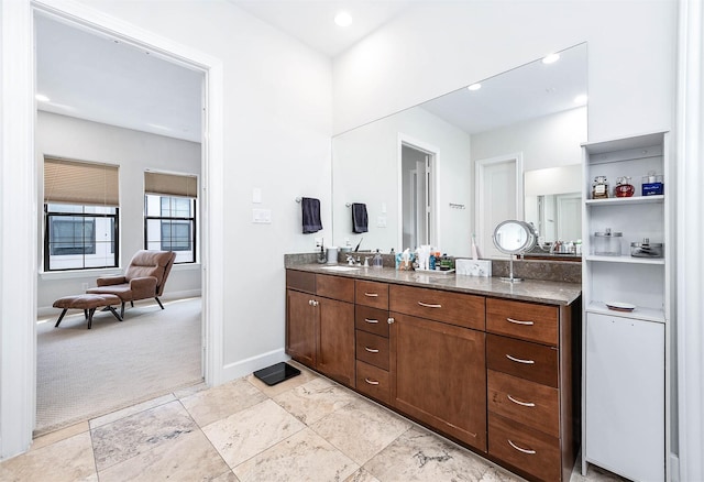4707 Jackson St, Houston, TX 77004 - full bath with double vanity, baseboards, and recessed lighting