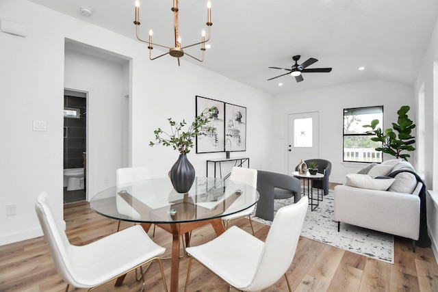 dining room featuring recessed lighting, baseboards, ceiling fan with notable chandelier, and light wood-type flooring