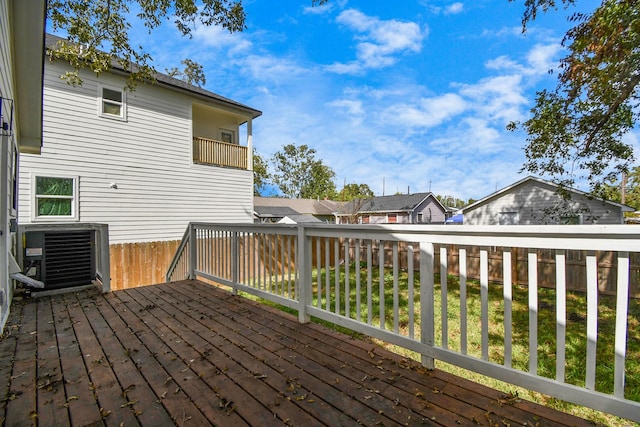 wooden terrace featuring central AC unit