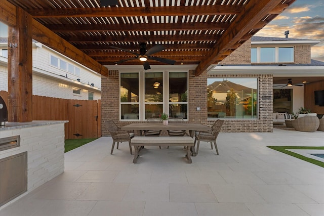 view of patio / terrace with a ceiling fan, fence, a pergola, and outdoor dining space