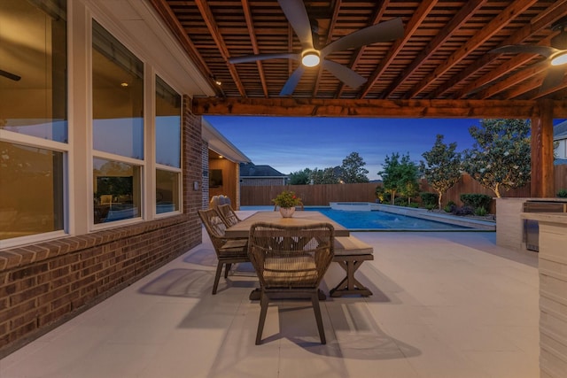 view of swimming pool featuring outdoor dining space, a fenced backyard, a fenced in pool, a ceiling fan, and a patio