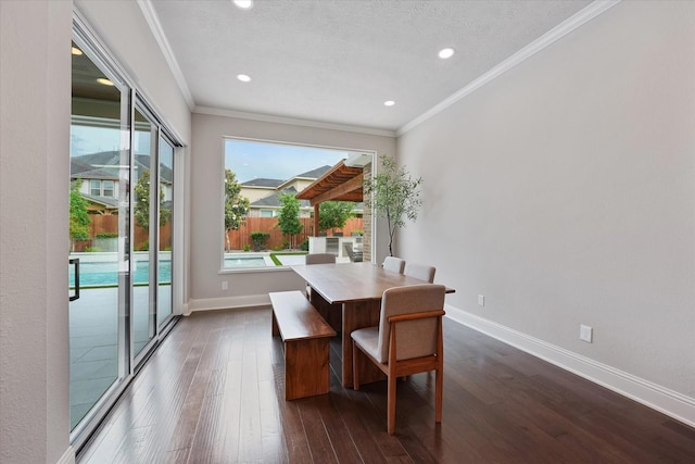 dining area with recessed lighting, baseboards, ornamental molding, and dark wood-style flooring