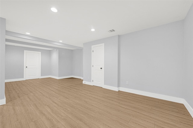 interior space featuring recessed lighting, baseboards, visible vents, and light wood-type flooring