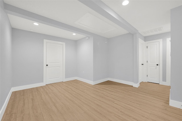 spare room with recessed lighting, baseboards, visible vents, and light wood finished floors