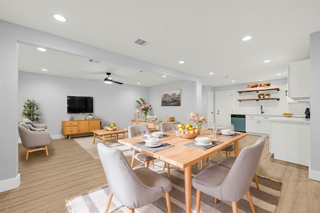 dining space featuring a ceiling fan, visible vents, baseboards, light wood finished floors, and recessed lighting