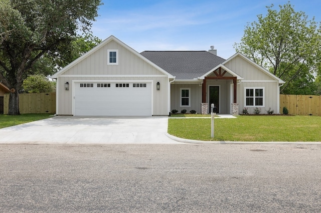 102 Tekla St, Weimar, TX 78962 - view of front facade featuring fence, a front lawn, a garage, a chimney, and concrete driveway