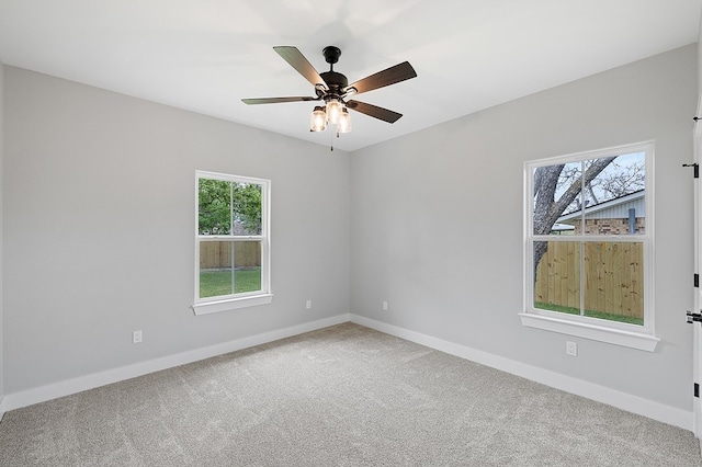 102 Tekla St, Weimar, TX 78962 - unfurnished room with baseboards, plenty of natural light, and carpet floors