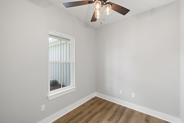 102 Tekla St, Weimar, TX 78962 - spare room with baseboards, dark wood finished floors, and ceiling fan