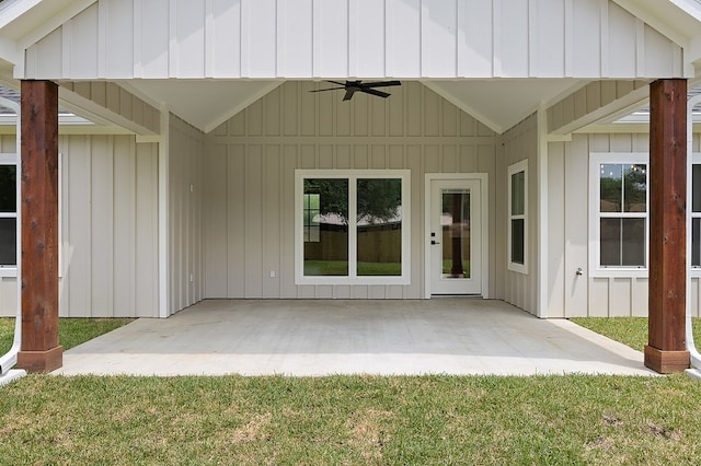102 Tekla St, Weimar, TX 78962 - exterior space with a patio, a ceiling fan, board and batten siding, and a yard