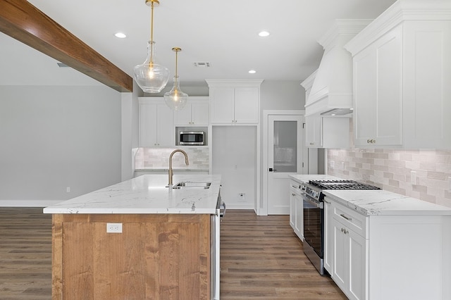 102 Tekla St, Weimar, TX 78962 - kitchen featuring backsplash, appliances with stainless steel finishes, dark wood-style floors, and a sink