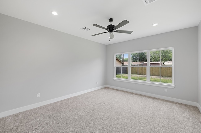 102 Tekla St, Weimar, TX 78962 - unfurnished room with visible vents, light carpet, baseboards, recessed lighting, and a ceiling fan