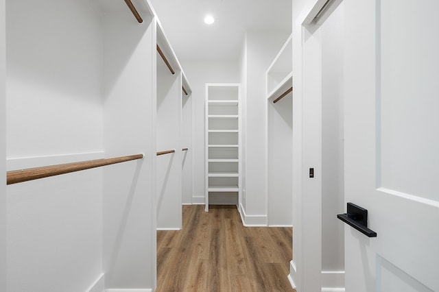 102 Tekla St, Weimar, TX 78962 - walk in closet with wood finished floors