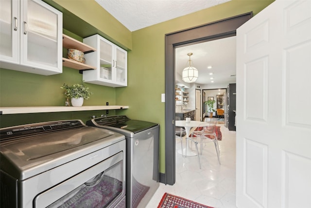 washroom featuring laundry area and independent washer and dryer