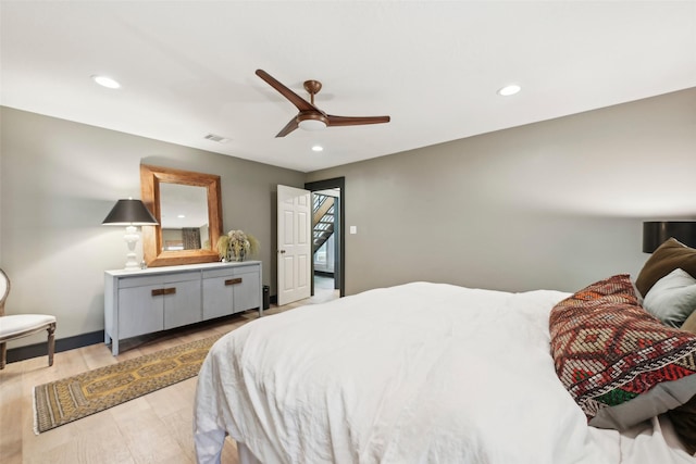 bedroom with ceiling fan, visible vents, baseboards, light wood finished floors, and recessed lighting