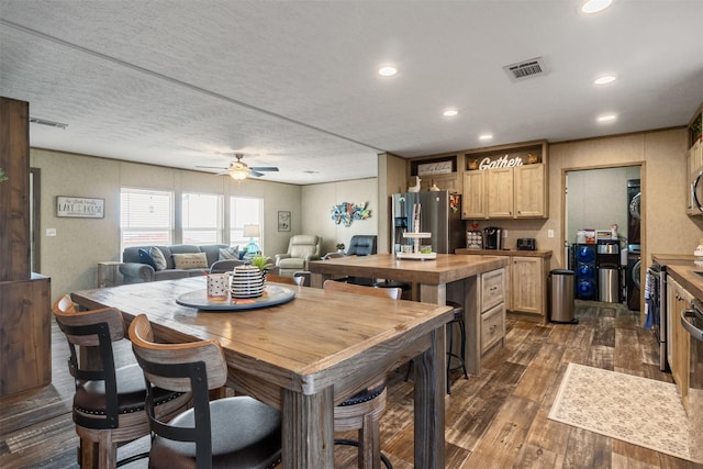 620 Lagoon Dr, Point Blank, TX 77364 - kitchen featuring a ceiling fan, dark wood-style flooring, visible vents, appliances with stainless steel finishes, and recessed lighting