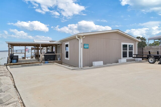 620 Lagoon Dr, Point Blank, TX 77364 - view of property exterior featuring fence