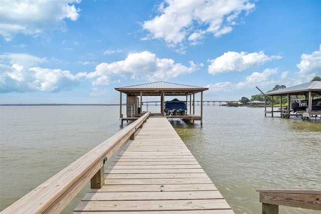 620 Lagoon Dr, Point Blank, TX 77364 - dock area featuring a water view and boat lift