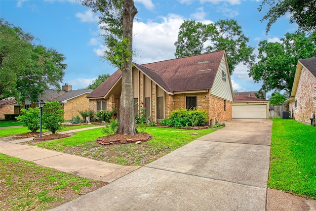 21426 Park York Dr, Katy, TX 77450 - mid-century modern home with brick siding, central AC unit, a front lawn, and roof with shingles
