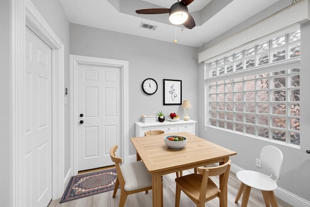 6542 Shinnecock Hills Dr, Houston, TX 77069 - dining area with baseboards, light wood-type flooring, and a ceiling fan