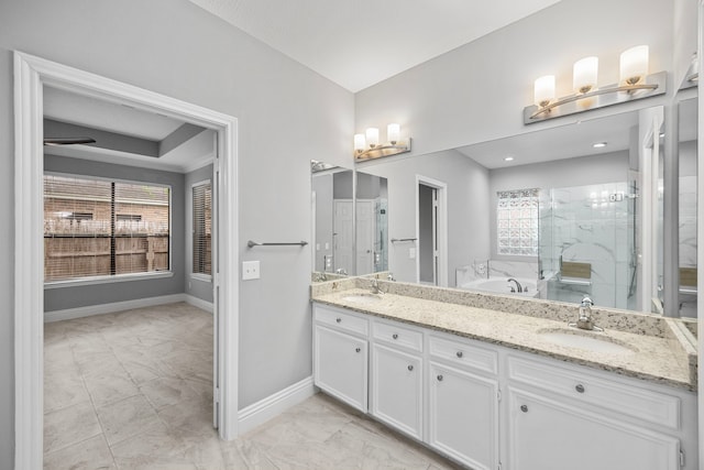 6542 Shinnecock Hills Dr, Houston, TX 77069 - bathroom with a shower stall, marble finish flooring, a bath, baseboards, and double vanity