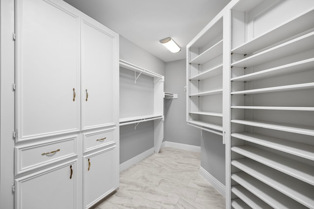6542 Shinnecock Hills Dr, Houston, TX 77069 - spacious closet with light marble finish floors