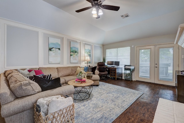 living room with dark wood-style flooring, french doors, a ceiling fan, vaulted ceiling, and visible vents