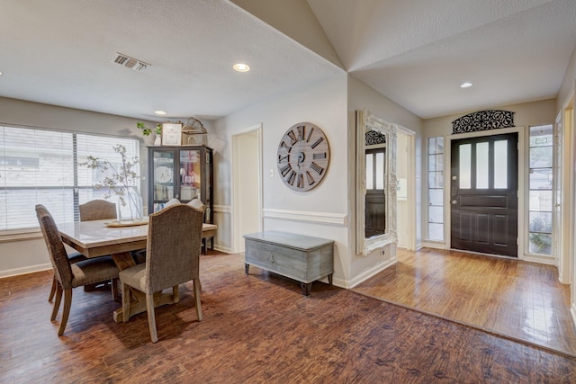 dining area featuring recessed lighting, baseboards, visible vents, and wood finished floors